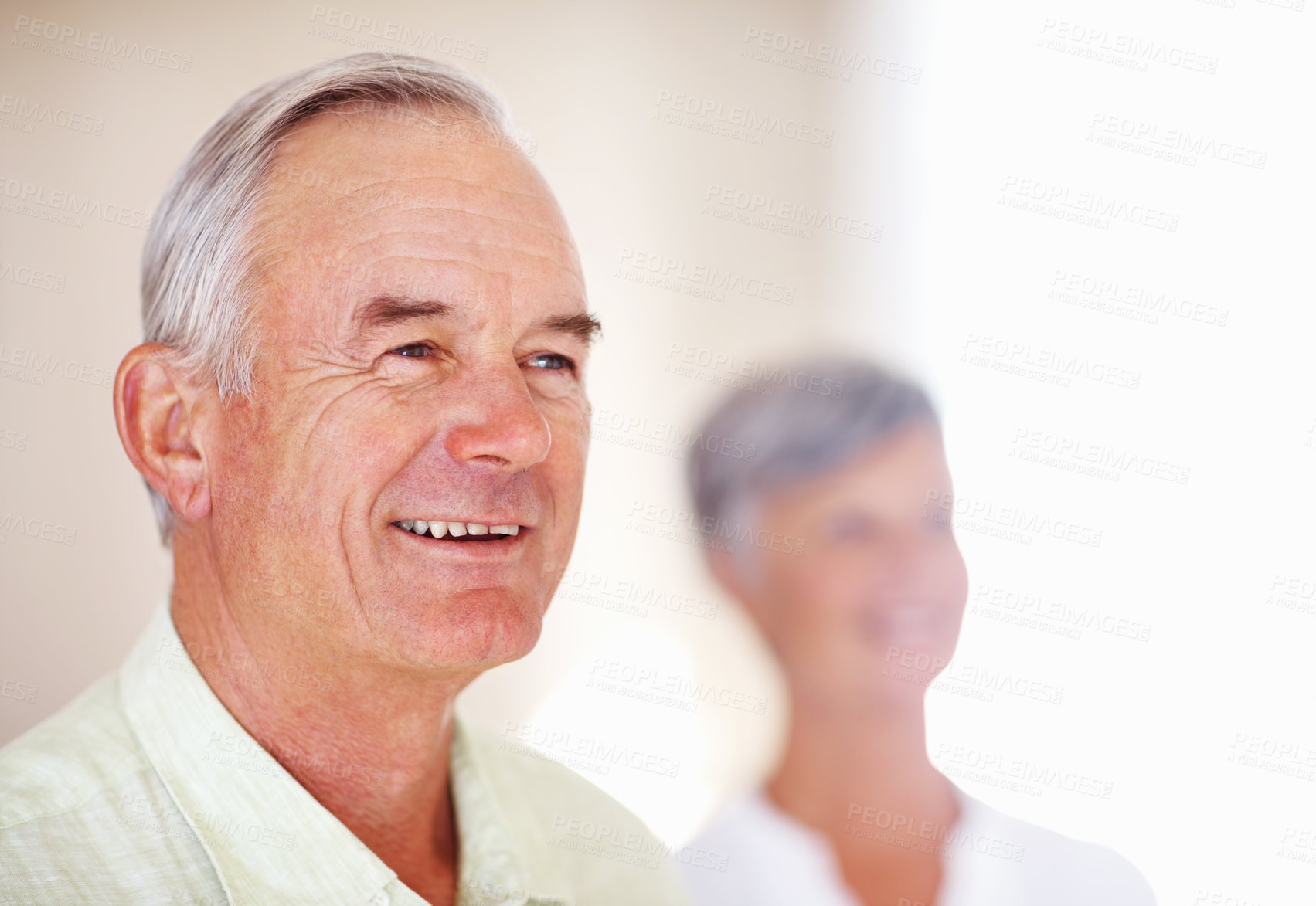 Buy stock photo Home, senior man and happy with thinking for retirement, memory and laugh with positive attitude. Elderly couple, male person and old woman in marriage for commitment, connection and smile in house