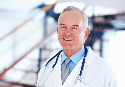 Buy stock photo Portrait of mature doctor with stethoscope smiling