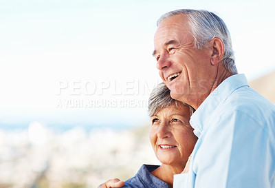 Buy stock photo Closeup of beautiful mature couple smiling while spending time outdoors