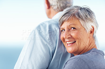 Buy stock photo Portrait of happy mature woman smiling while standing behind man outdoors