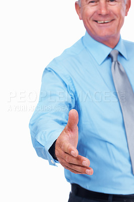 Buy stock photo Happy mature business man extending hand to shake over white background