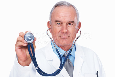 Buy stock photo Portrait of mature doctor holding stethoscope over white background