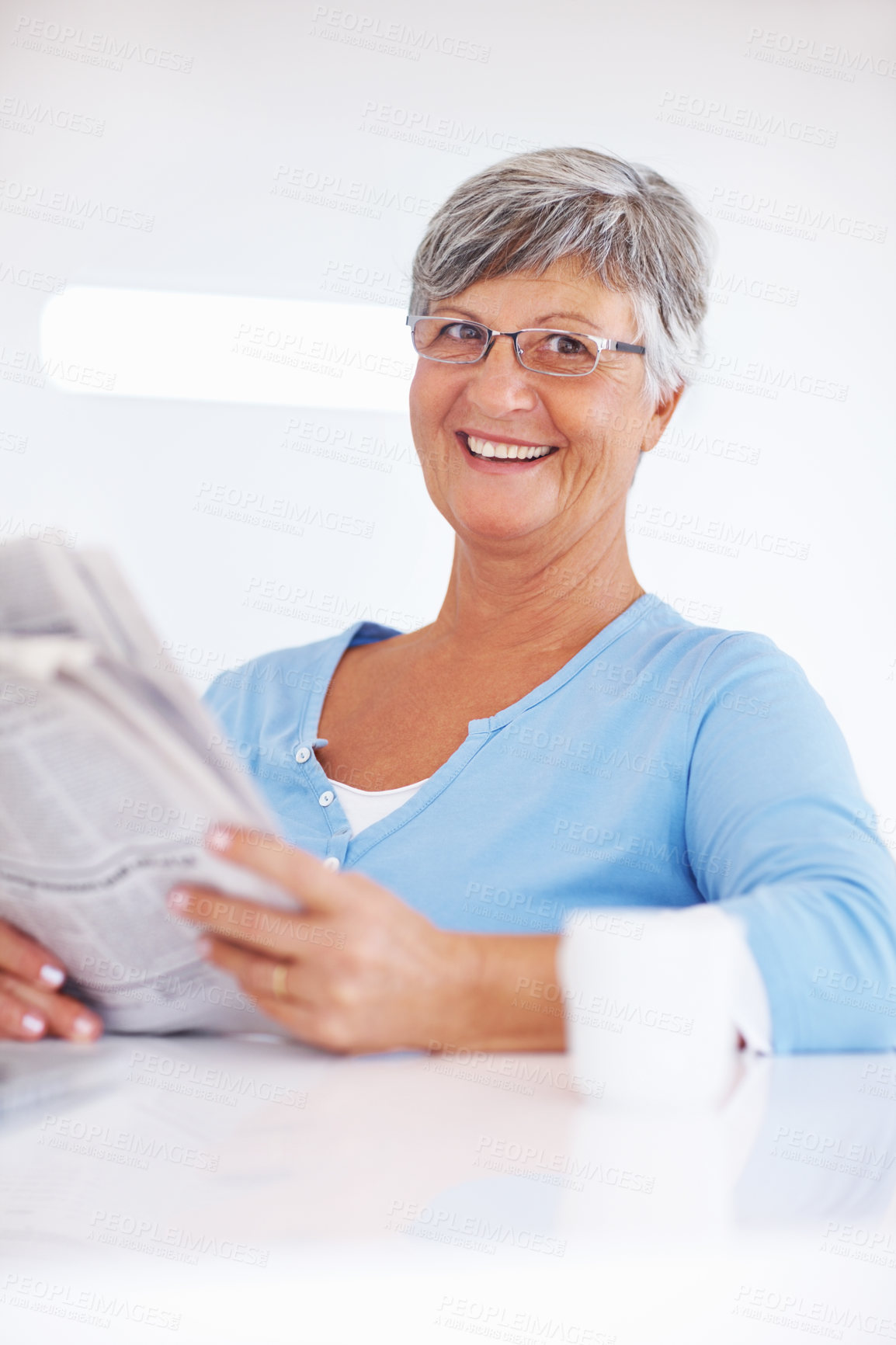 Buy stock photo Senior woman, newspaper and thinking in home, headline announcement and relax in retirement. Female person, contemplating story and reading paper for information update, global event and print media