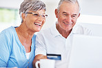 Mature couple shopping online