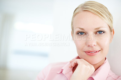 Buy stock photo Closeup shot of an attractive young businesswoman standing with her hand on her chin