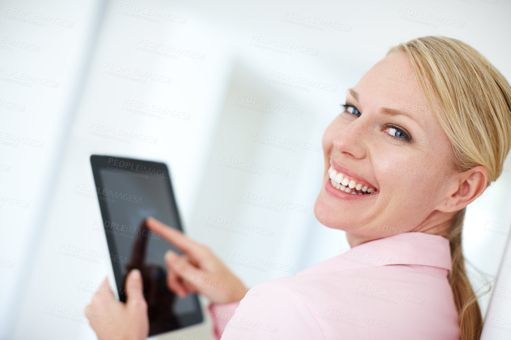 Buy stock photo Happy woman, portrait and touch with tablet screen for browsing, social media or UI at office. Young, female person or employee with smile or technology display for UX, online research or news