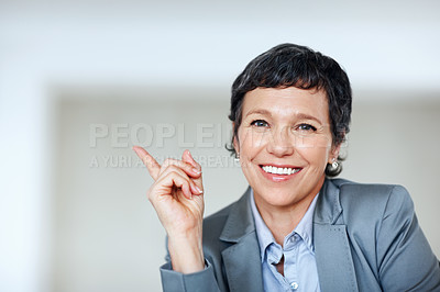 Buy stock photo Business, pointing and portrait with mature woman in office for professional management career. Direction, introduction or showing with confident employee person in workplace for job opportunity