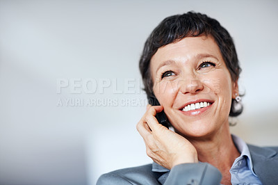 Buy stock photo Low angle view of smiling business woman using cellphone at home