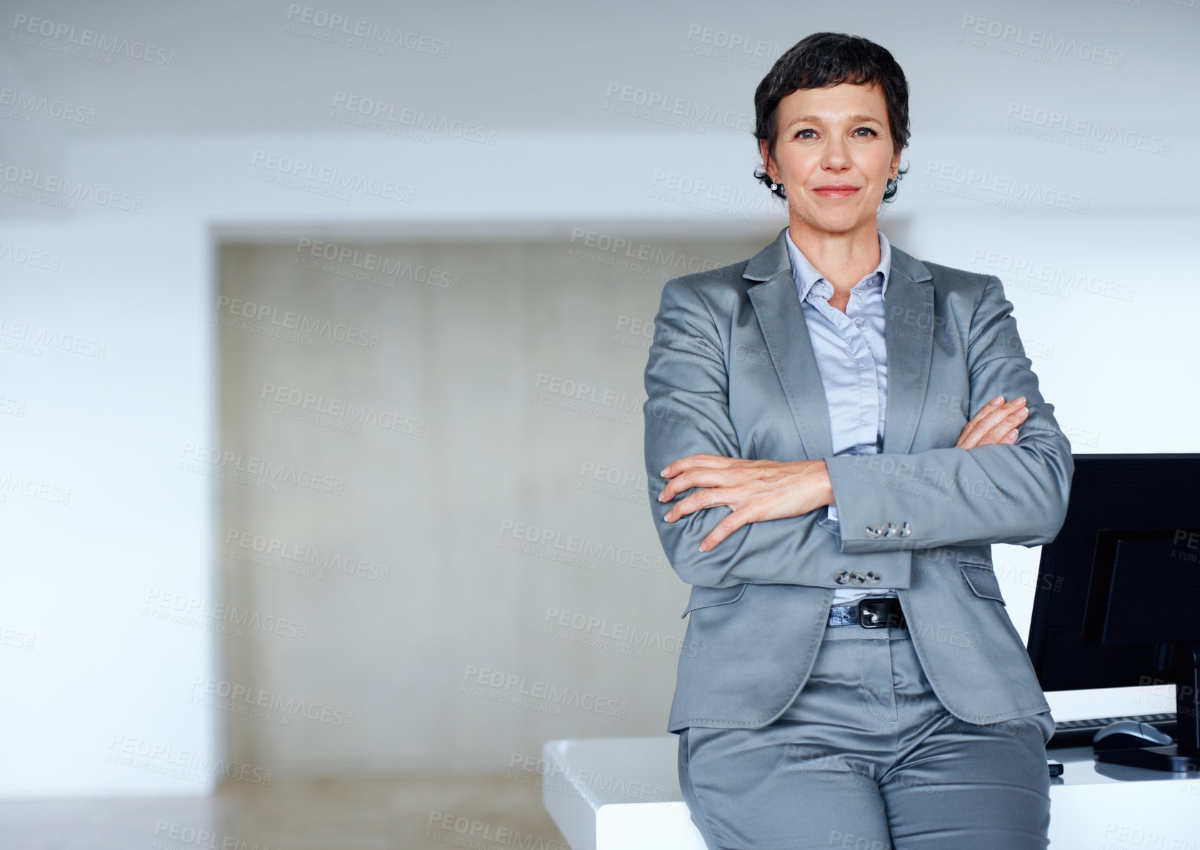 Buy stock photo Arms crossed, business and portrait with mature woman at desk in office for professional management career. Company, corporate and executive with serious employee person in workplace for empowerment