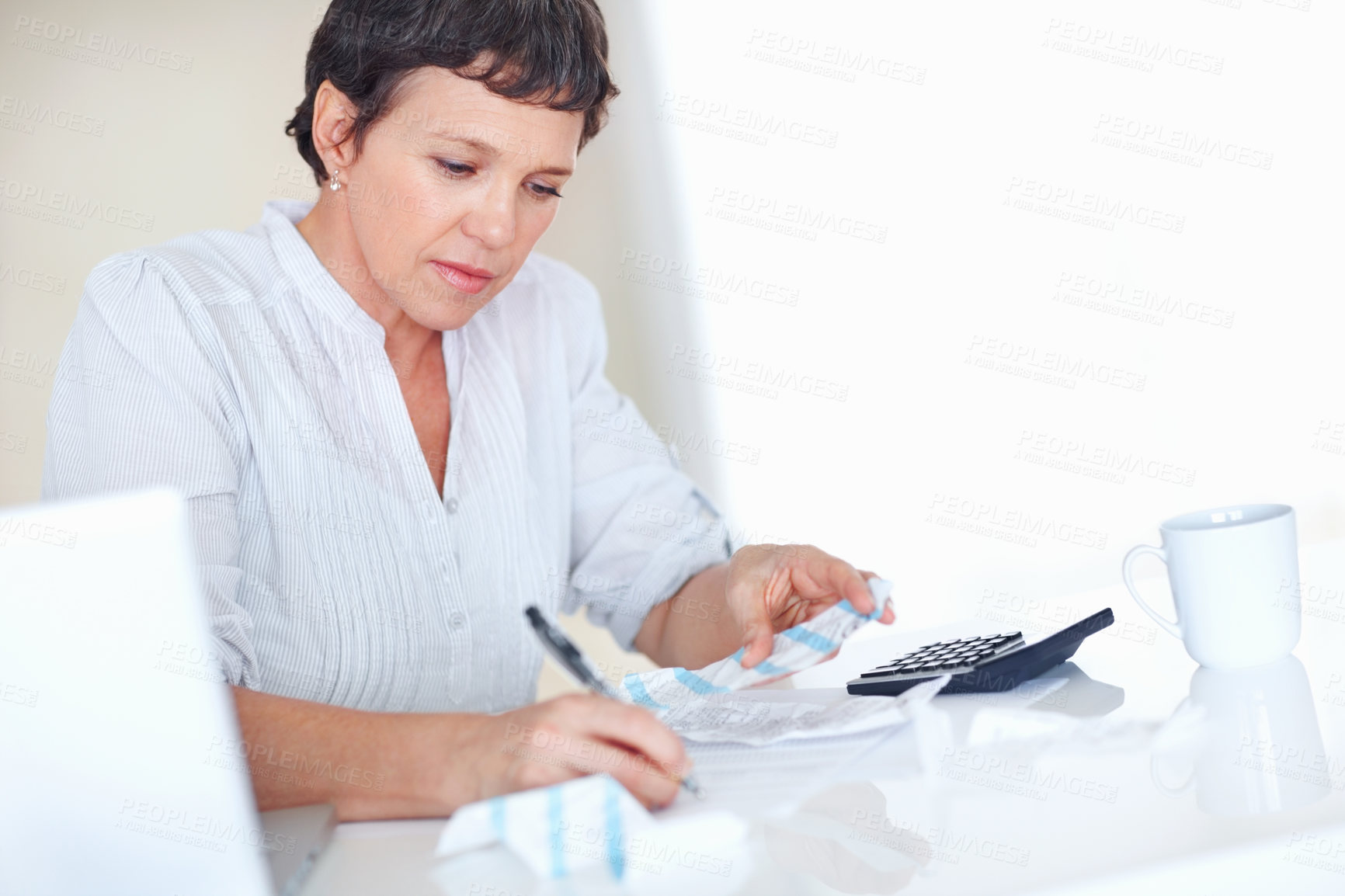 Buy stock photo Home, mature woman and bills with calculator for financial expenses, tracking cost and budgeting. House, female person and finance management with receipt for taxes, payment proof and interest rate 