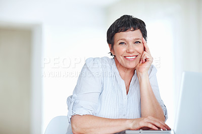 Buy stock photo Mature woman, happy and laptop for business research, communication and networking clients in office. Accountant, portrait and technology for financial spreadsheet, profit report and bookkeeping app