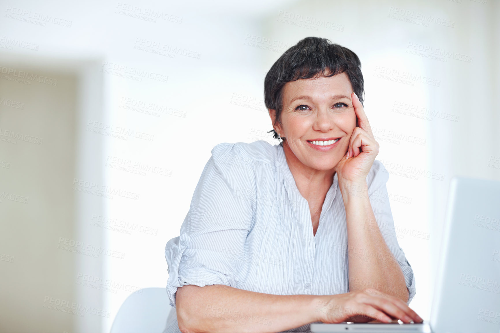 Buy stock photo Mature woman, happy and laptop for business research, communication and networking clients in office. Accountant, portrait and technology for financial spreadsheet, profit report and bookkeeping app