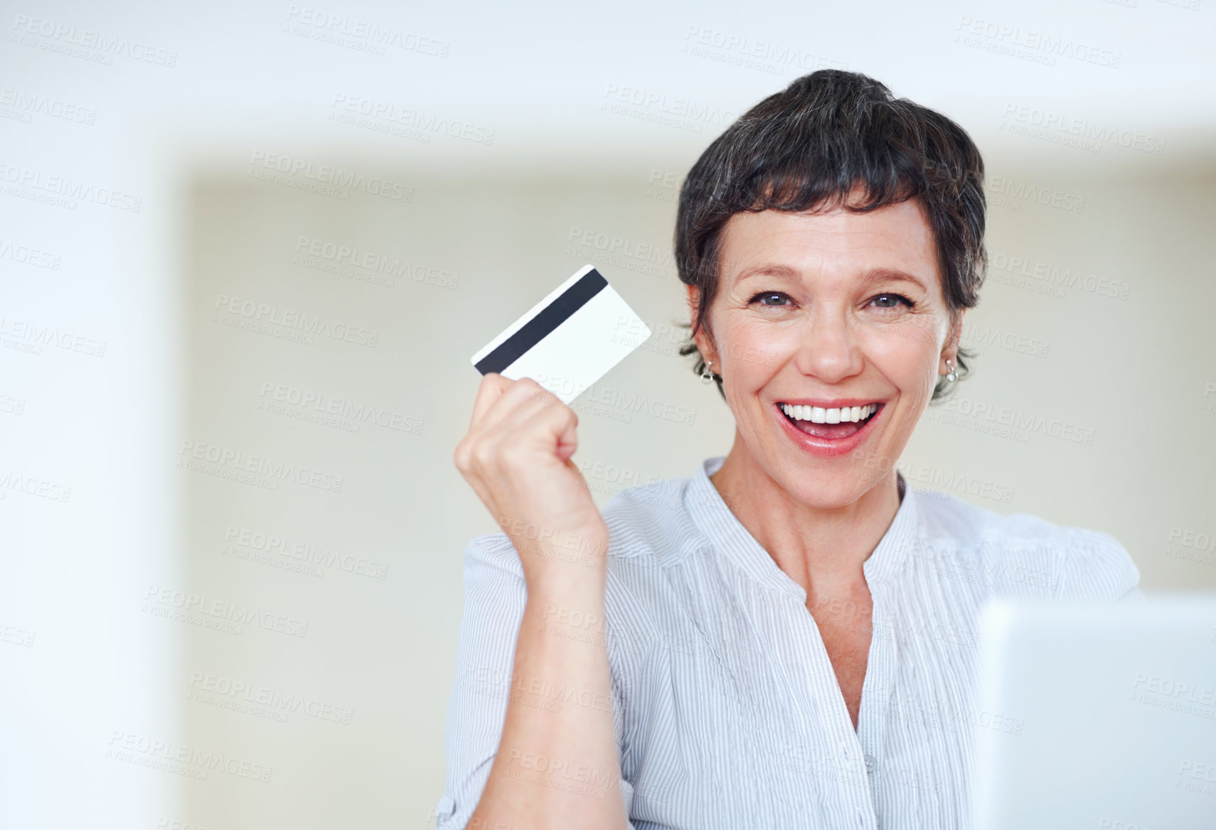 Buy stock photo Happy mature business woman shopping online using laptop and credit card