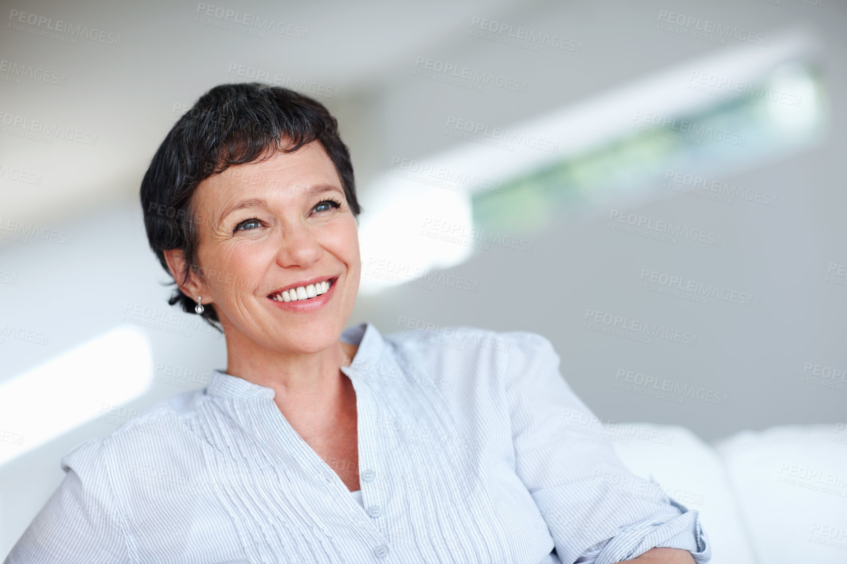 Buy stock photo Mature woman, happy and thinking on sofa in home with nostalgia, memory and daydreaming. Relax, person and thoughtful on couch in living room with wondering, inspiration and reflection with space