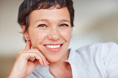 Buy stock photo Happy woman, relax and portrait in home or house to relax with pride in lounge of apartment. Mature real estate agent, smile or face of confident realtor resting in France break, wellness or day off