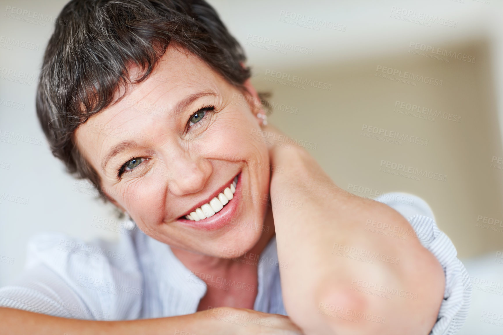 Buy stock photo Mature woman, happy and portrait in apartment to relax with pride in lounge, home and house. Real estate agent, smile or face of female person resting to chill in France break, wellness or day off