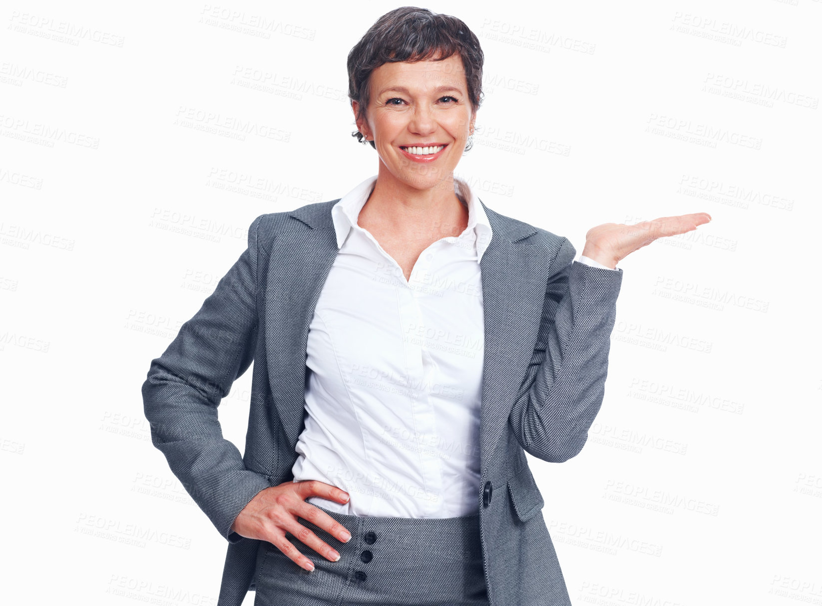 Buy stock photo Business, woman and smile in studio with hand gesture for presentation and instructions in white background. Female person, employee and happy in confidence, portrait and mockup space for offer