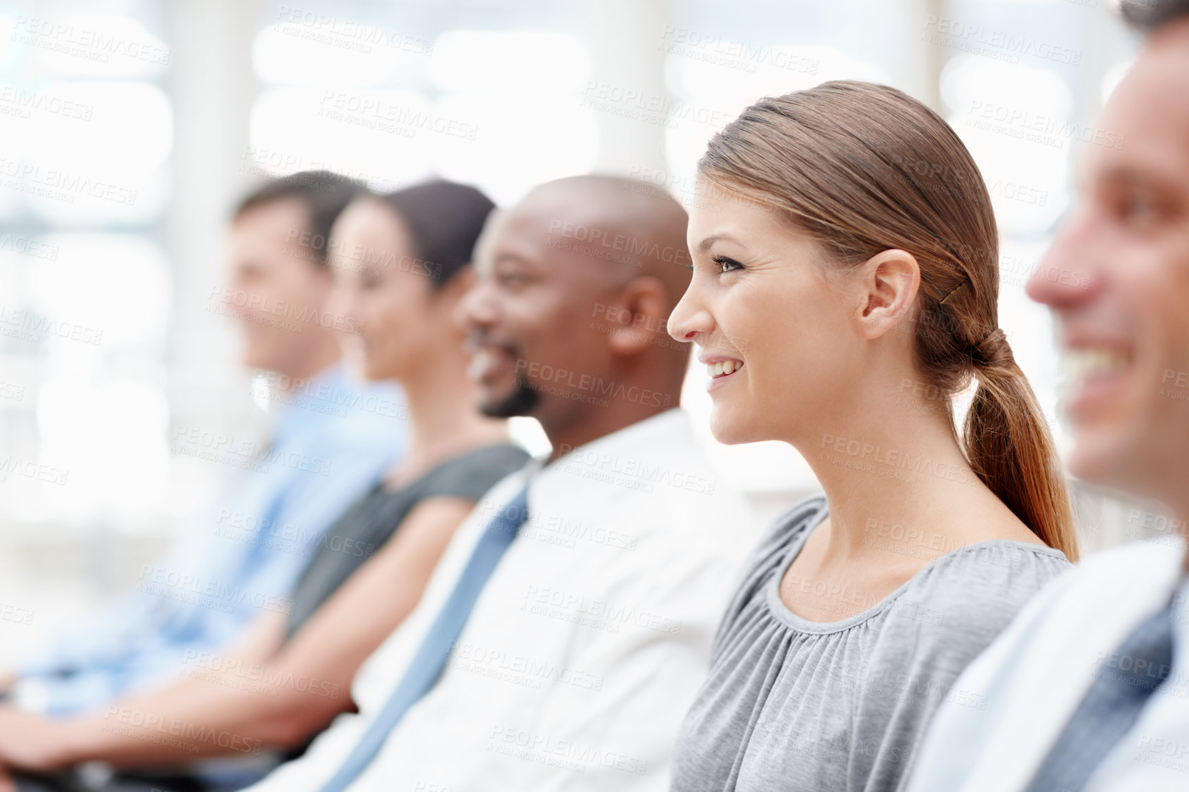 Buy stock photo Listening, learning and businesswoman in audience for seminar, workshop or conference. Happy employees, smile or colleagues in presentation for staff training, development or convention at workplace