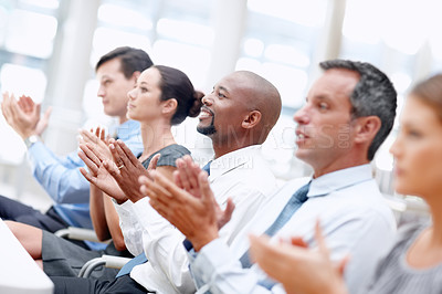 Buy stock photo Business team applauds as a seminar concludes