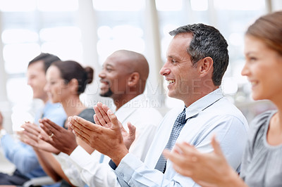 Buy stock photo Business team applauds at a convention