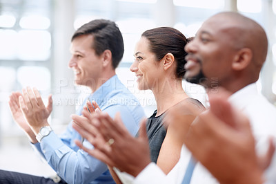 Buy stock photo Team of happy colleagues applaud while in a business meeting