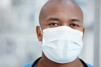 Buy stock photo Closeup of an African-American surgeon wearing a surgical mask - portrait