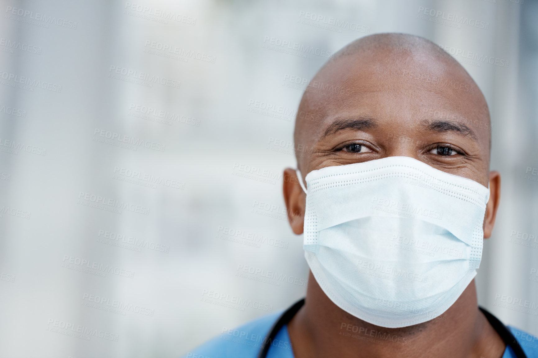 Buy stock photo Closeup of an African-American surgeon wearing a surgical mask - copyspace