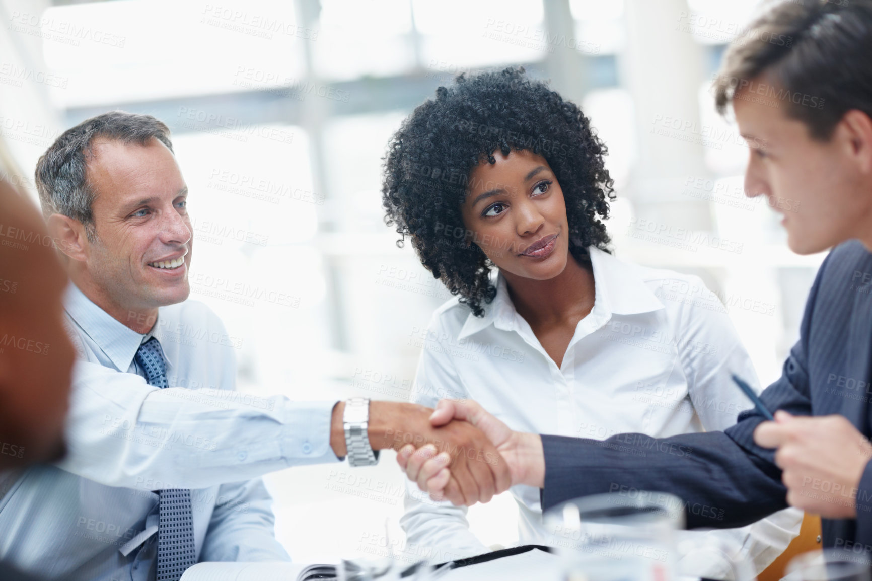 Buy stock photo Business people, meeting and team with handshake for collaboration, hiring or deal at office. Businessman, colleagues or employees shaking hands for contract agreement, b2b or mission at workplace