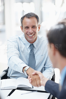 Buy stock photo Businessman, meeting and partnership with handshake for collaboration, hiring or deal at office. Business people, colleagues or employees shaking hands for contract, agreement or b2b at workplace