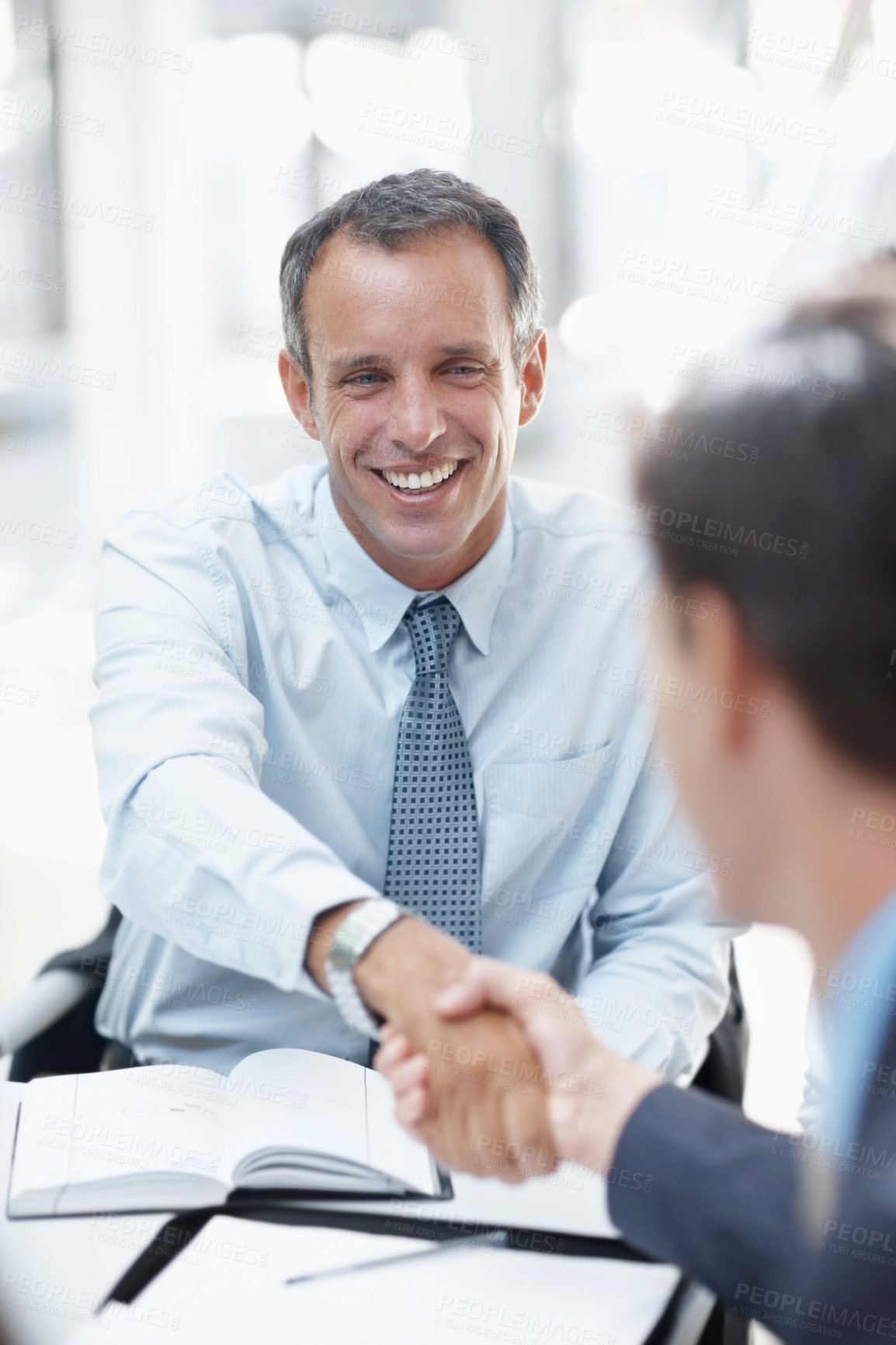 Buy stock photo Businessman, meeting and partnership with handshake for collaboration, hiring or deal at office. Business people, colleagues or employees shaking hands for contract, agreement or b2b at workplace