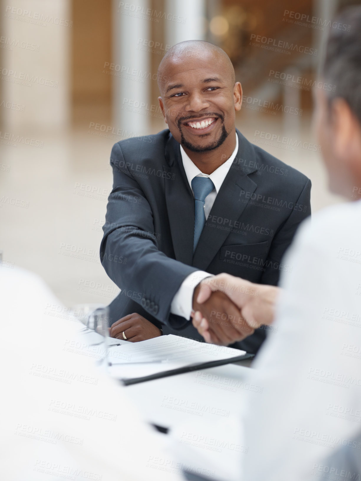 Buy stock photo Happy, businessman and meeting with handshake for deal, teamwork or collaboration at office. Business people, colleagues or employees shaking hands for contract agreement, b2b or mission at workplace