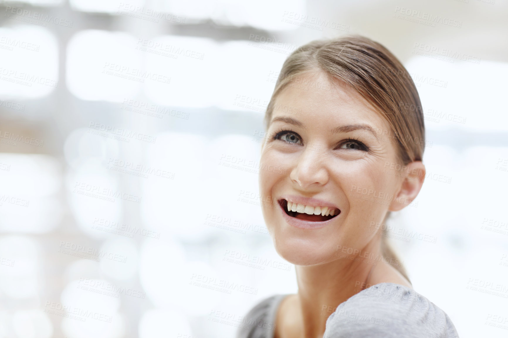 Buy stock photo A happy young woman smiling