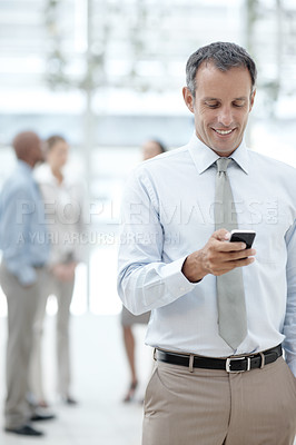 Buy stock photo Happy man, mobile or reading in office space for business, schedule or innovative calendar app. Mature estate agent, staff or phone in realtor agency for planning, positive feedback or client contact