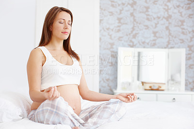 Buy stock photo Woman, pregnant and yoga in home for meditation, mindfulness or healthy prenatal development on bed. Female person, pregnancy and fitness as maternity for exercise, zen or chakra with holistic health