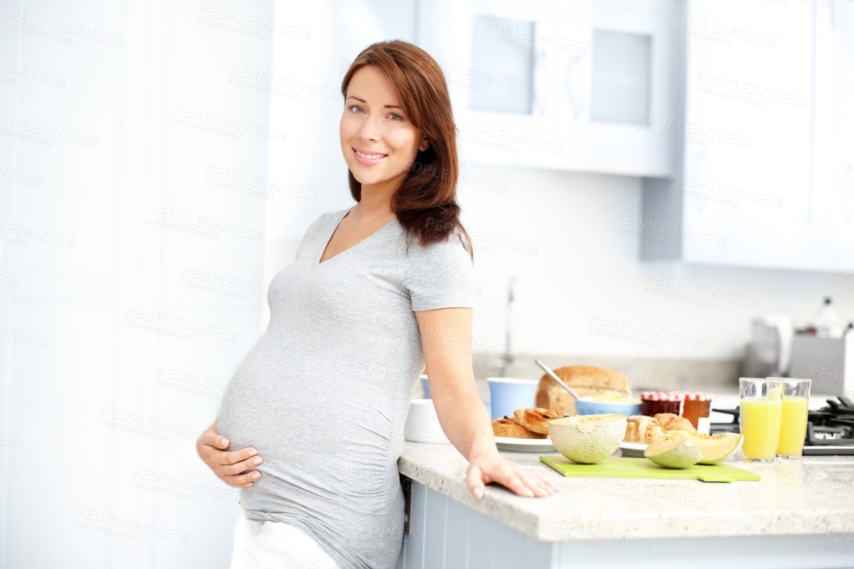 Buy stock photo Pregnant, woman and portrait with food in kitchen healthy breakfast, prenatal nutrition and wellness. Person, smile and lunch meal in home for pregnancy benefits, maternity health and baby growth