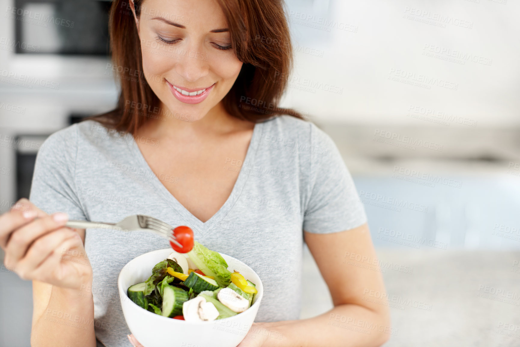 Buy stock photo Happy woman, wellness and eating salad in house with smile, healthy breakfast and balance for vitamins. Morning, hungry and mother to be with organic food for fresh meal, benefits and diet nutrition