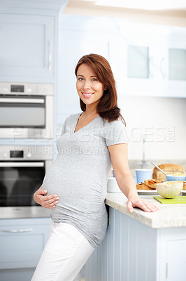 Buy stock photo Pregnant, woman and portrait with smile in kitchen for healthy breakfast, prenatal nutrition and wellness. Person, food and lunch meal in home for pregnancy benefits, maternity health and baby growth