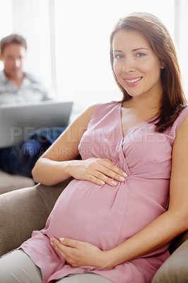 Buy stock photo Pregnant woman, portrait and rest in relax, happiness or comfort for baby development in family home. Female person, stomach and sofa as mother for growth on weekend for break, peace or calm in house