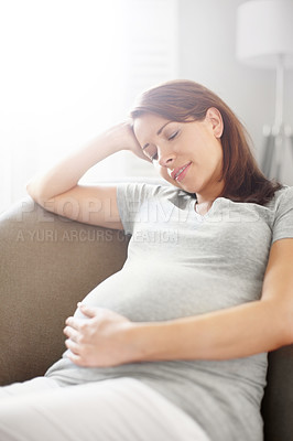 Buy stock photo Pregnant woman, wellness and chair in relax, comfort or happiness for baby development in living room. Female person, waiting and rest as mother for growth on weekend for break, peace or calm in home