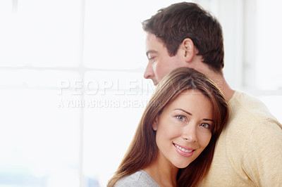 Buy stock photo Portrait of a beautiful woman being embraced by her husband - Copyspace