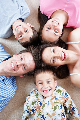 Buy stock photo Top view, pajamas or portrait of happy family with siblings in home for support, love or wellness. Smile, mother or dad on floor with boys, children and kids for bonding together with girl in morning