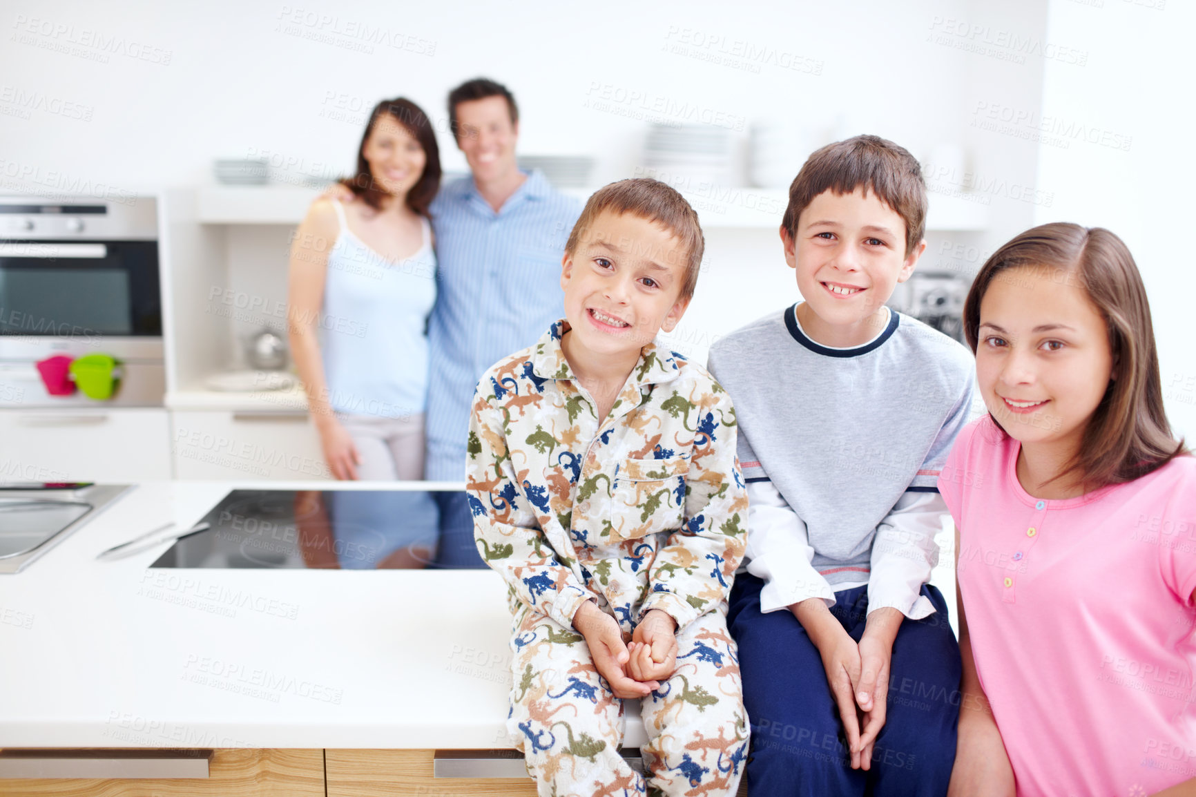 Buy stock photo Smile, kitchen and portrait of children with parents in home for bonding, connection and family time. Happy, love and kid siblings with mother and father for care together at house in Germany.