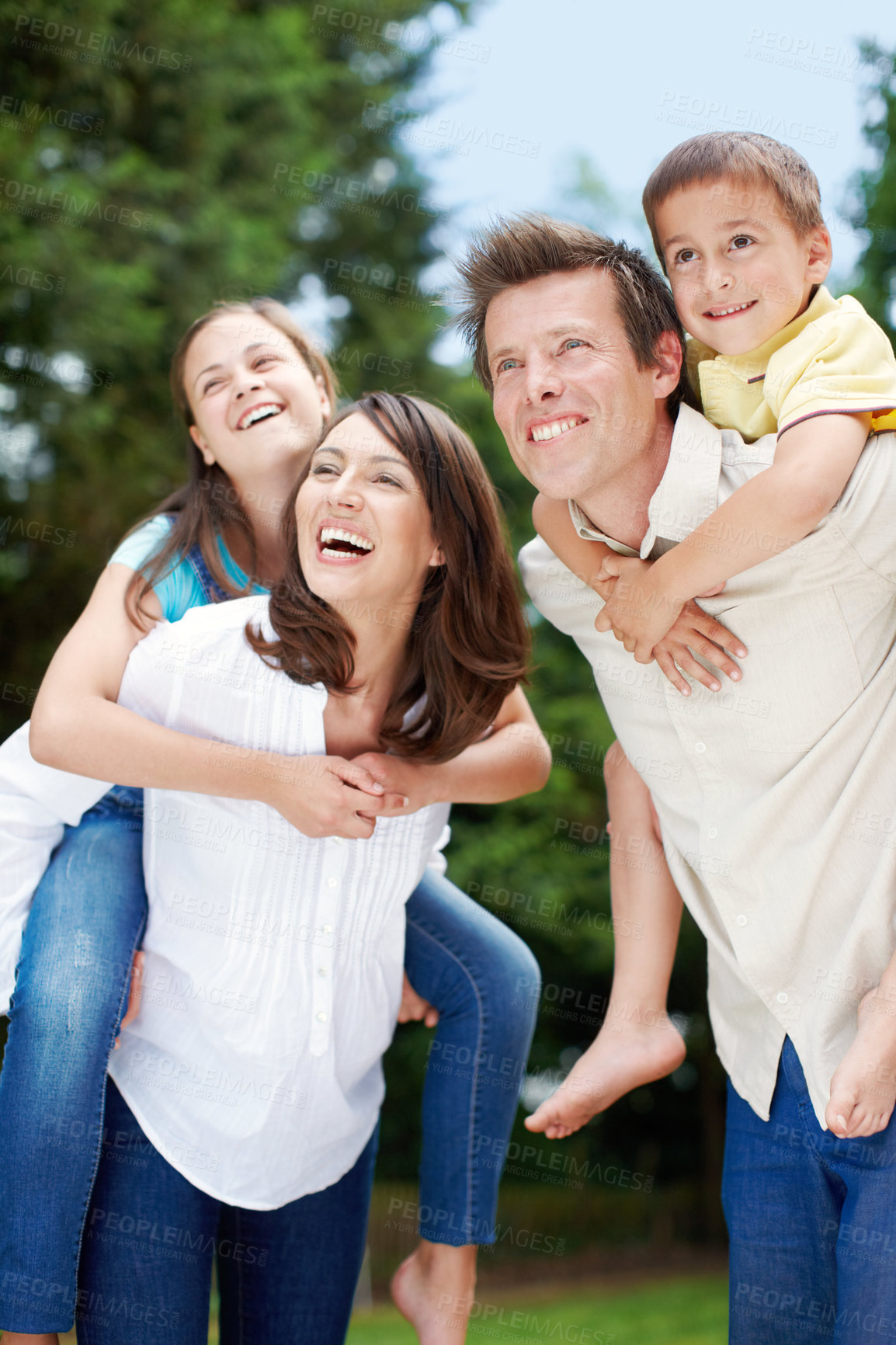 Buy stock photo Family, park and laugh outdoor with piggy back, game and smile with mom, dad and kids. Bonding, love and care with happy youth and hug in nature with trees, fun weekend and summer break in garden