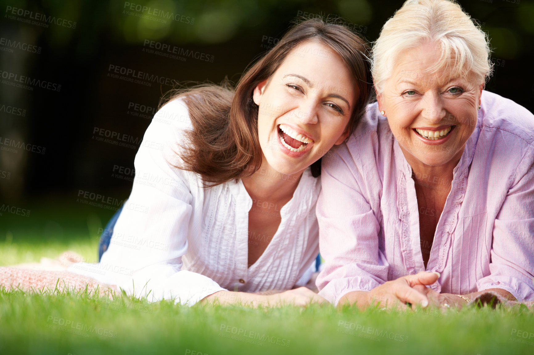 Buy stock photo Park, senior mother and woman in portrait with laughing, connection and bonding together as family. Happy people, mom and adult daughter with smile for joke, security and love on holiday in Sydney