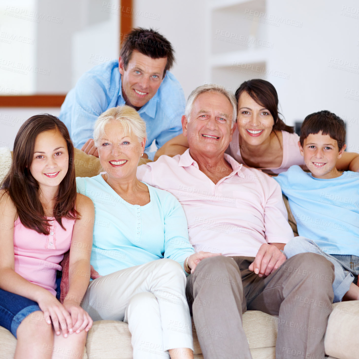 Buy stock photo Family, portrait and home with parents, children and grandparents together with care on sofa. Generations, happy and smile with love, bonding and support with hug relax in living room on weekend