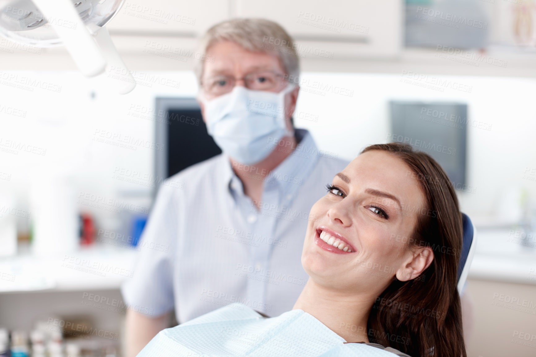 Buy stock photo Portrait of smiling patient with mature doctor in clinic