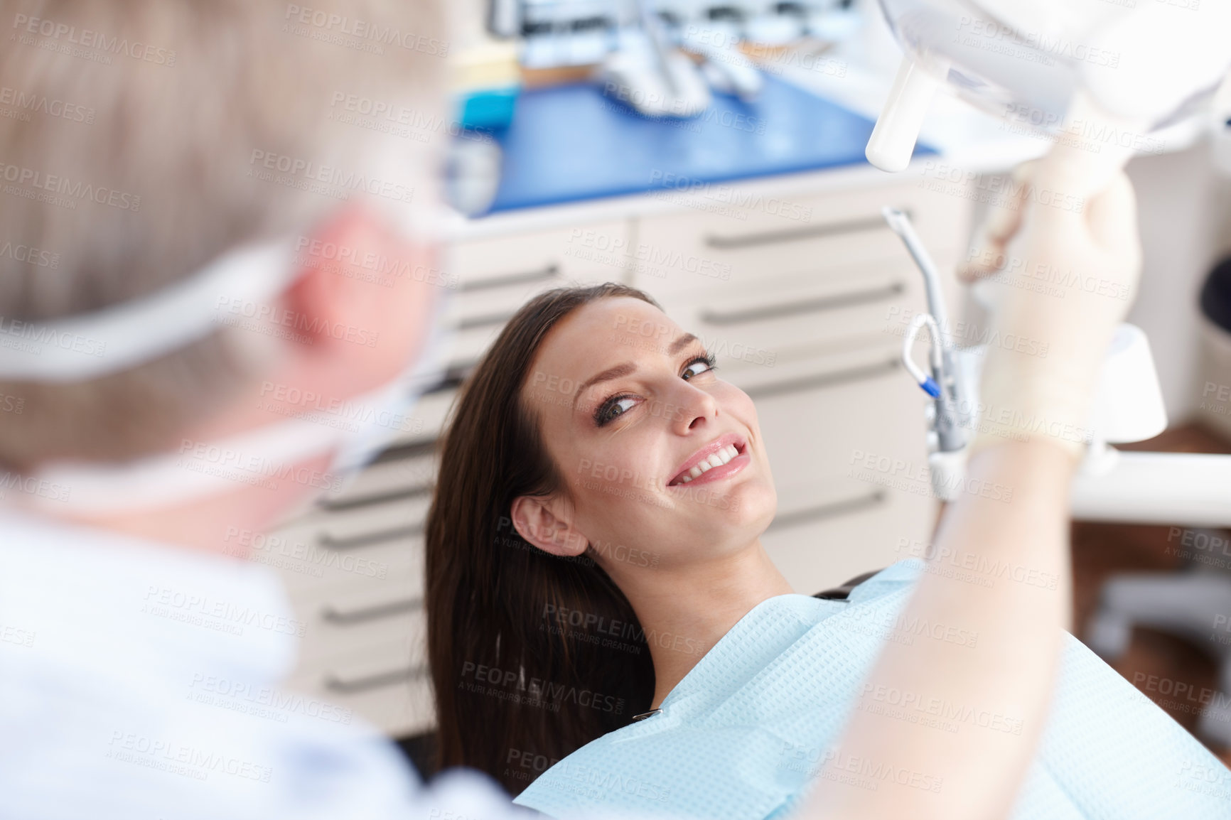 Buy stock photo Clinic, happy and dentist with woman for consulting, teeth whitening and oral health on chair. Healthcare, dentistry and man with patient with tools for dental hygiene, cleaning and medical service