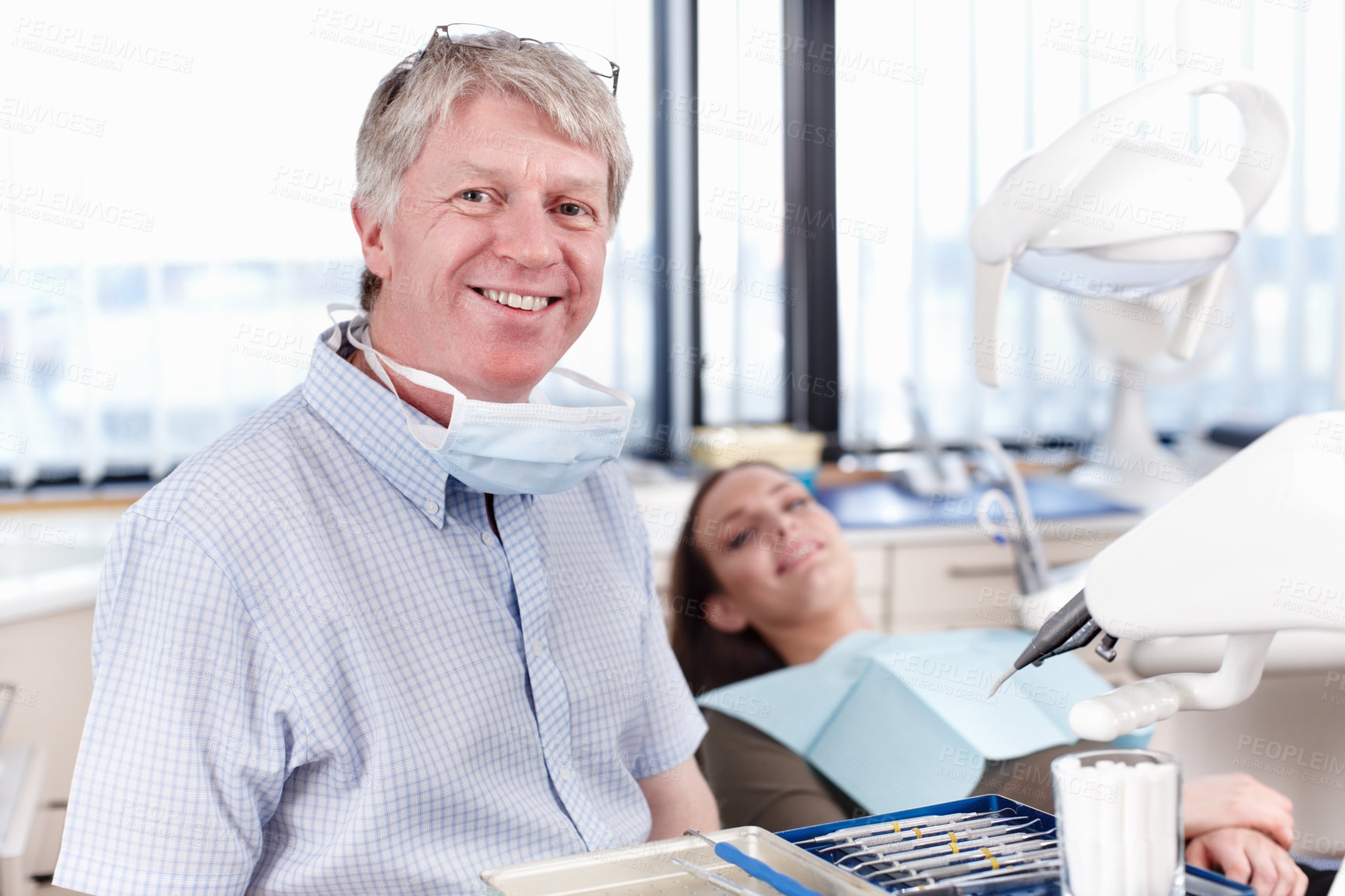 Buy stock photo Happy, patient and portrait of dentist for consulting, teeth whitening and oral health in clinic. Healthcare, dentistry and man with woman with tools for dental hygiene, cleaning and medical service