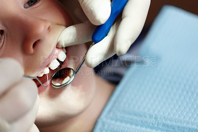 Buy stock photo Closeup of young boy taking dental treatment in clinic