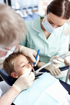 Buy stock photo Portrait of young dental patient taking treatment at dentist clinic